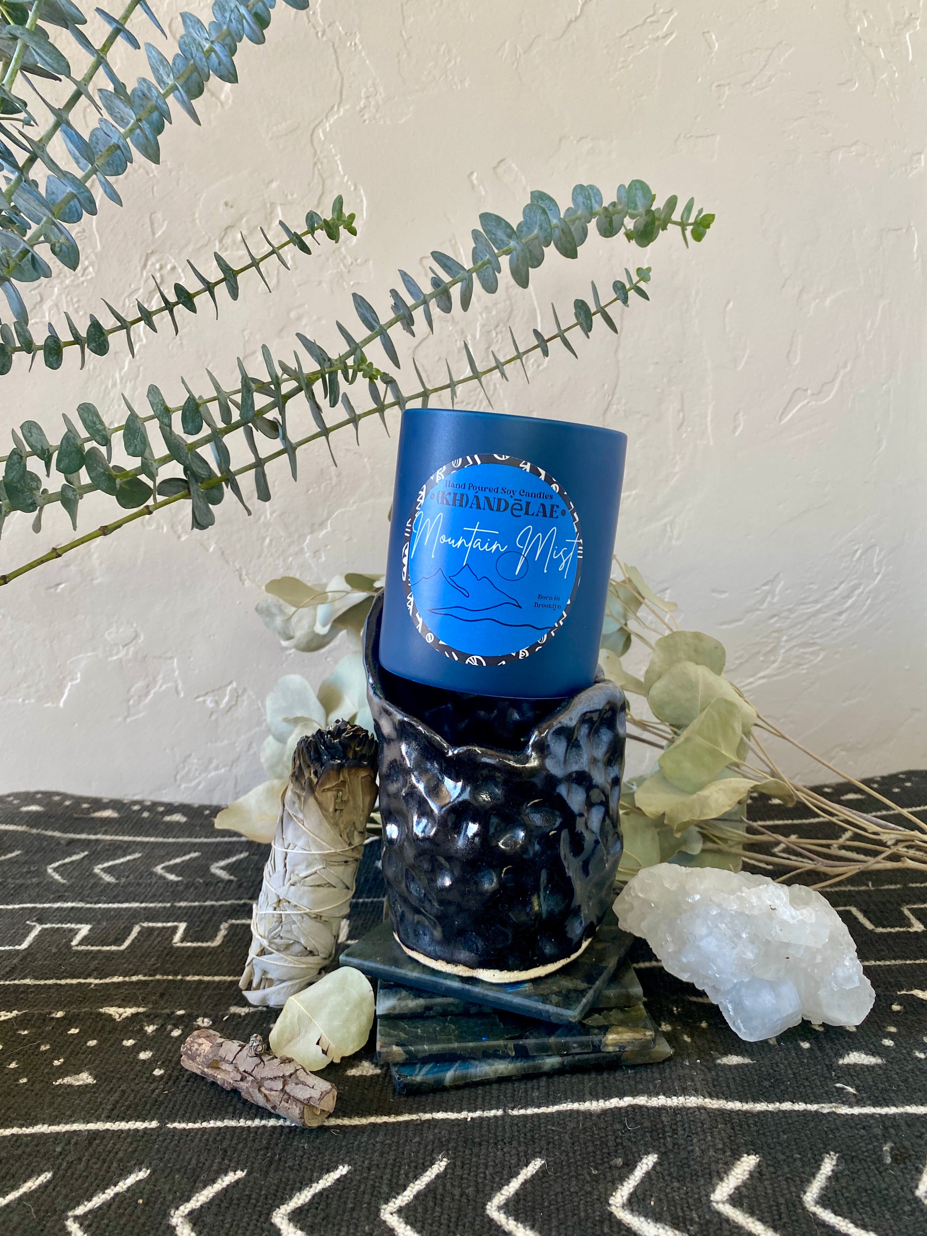 Light it. Go There. Mountain Mist coconut-soy candle